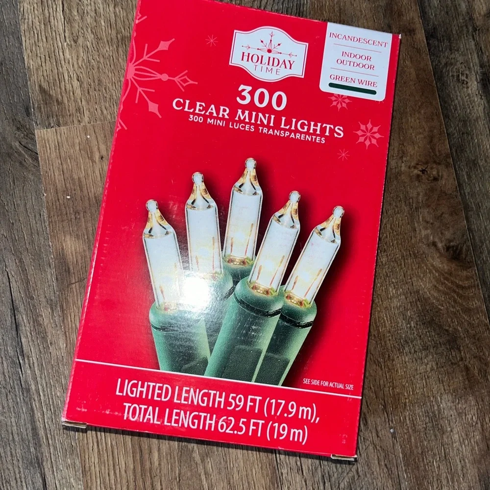 Holiday Time Clear Mini String Lights with Green Wire on Red Packaging